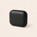 Black leather earbud case, three-quarter view
