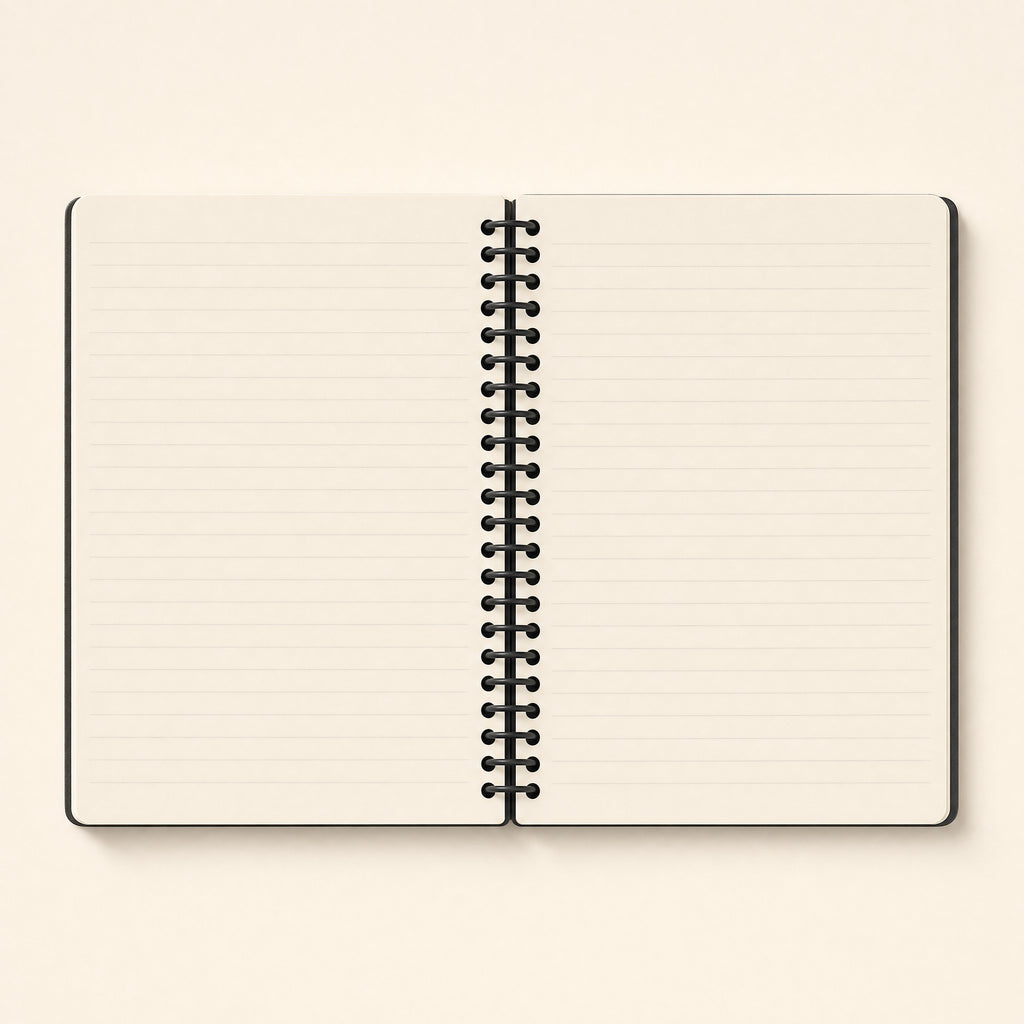 Spiral notebook open flat, showing the lined pages