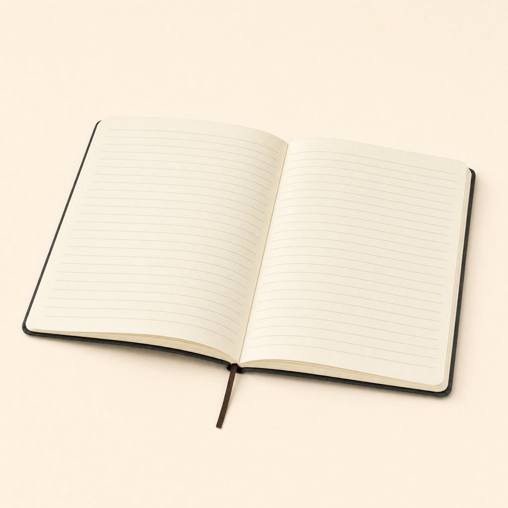 The notebook open, showing the cream ruled pages